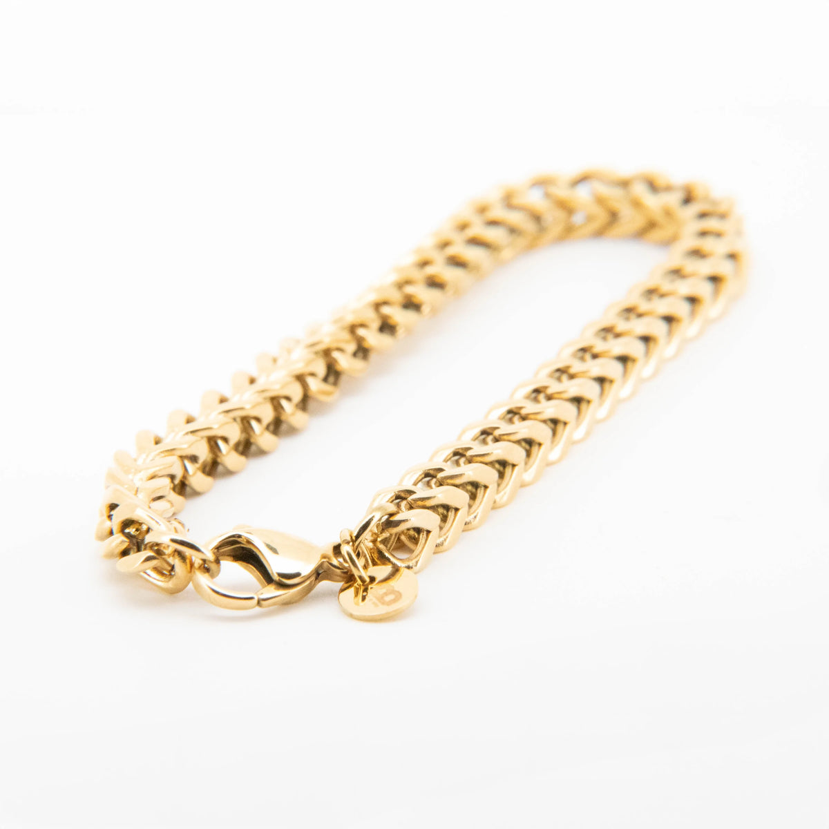 Gold chain bracelet with a woven link pattern.