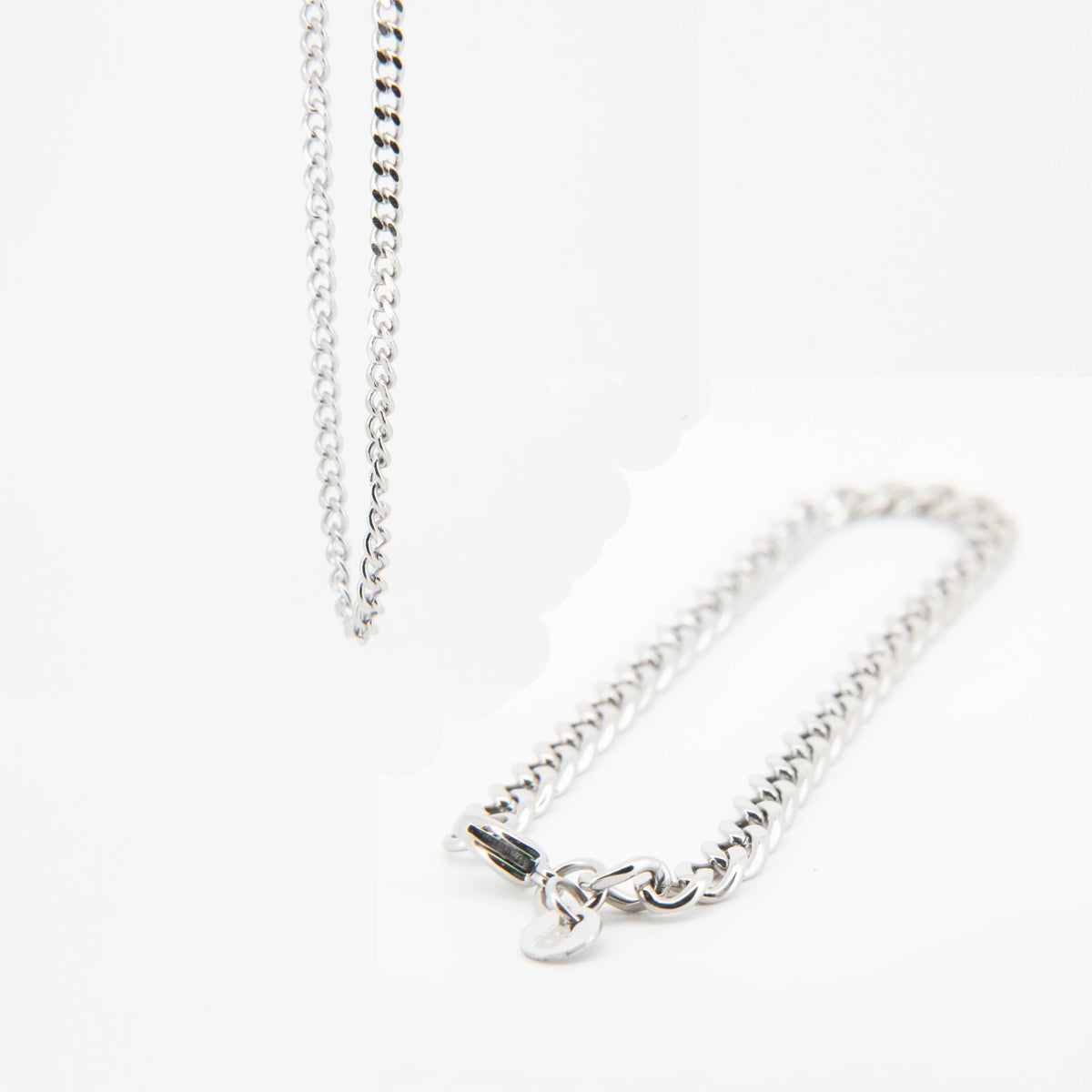 Silver chain necklace with a clasp.