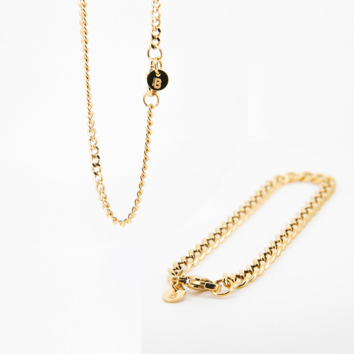 Gold chain necklace with delicate links and a clasp.