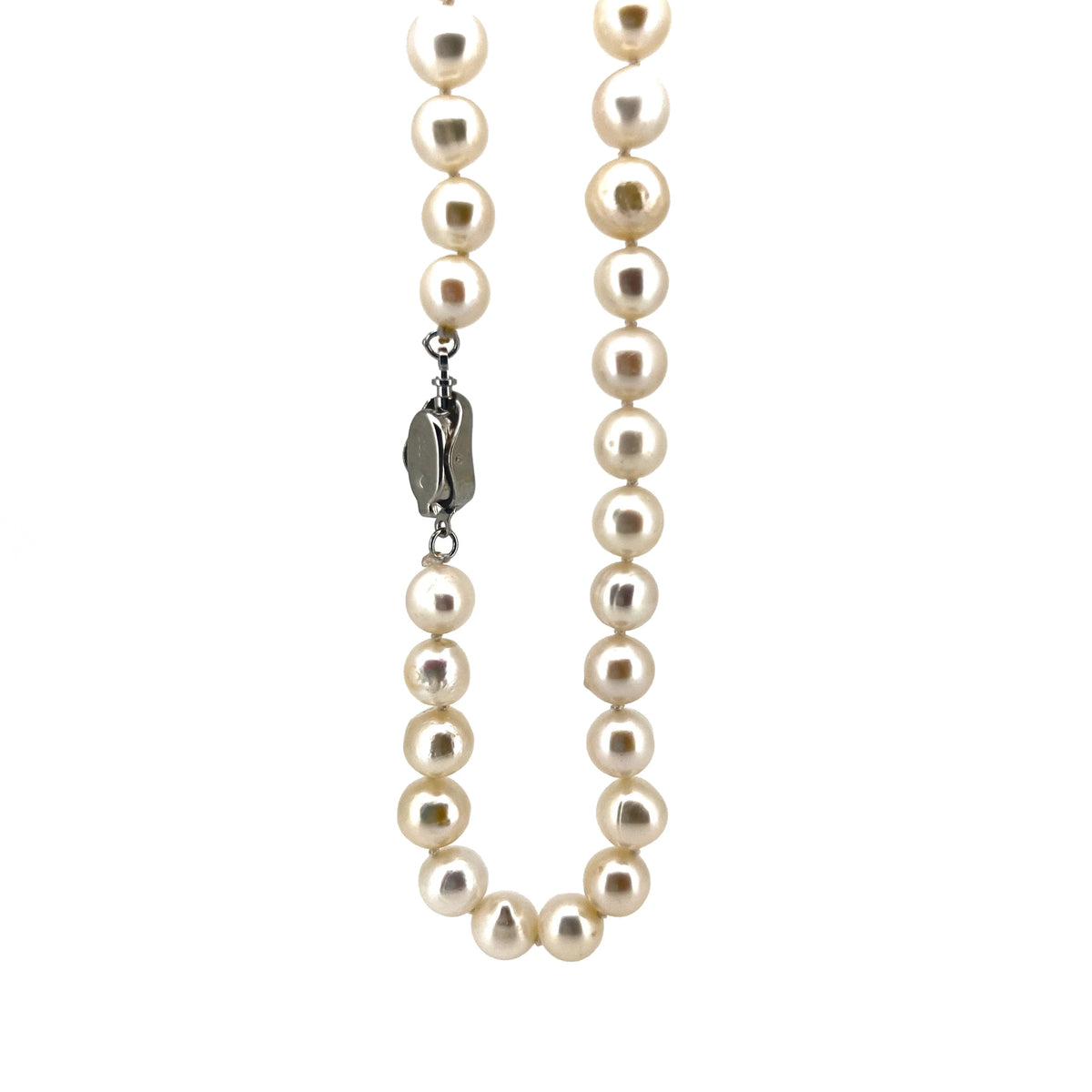 Pearl necklace with a silver clasp.