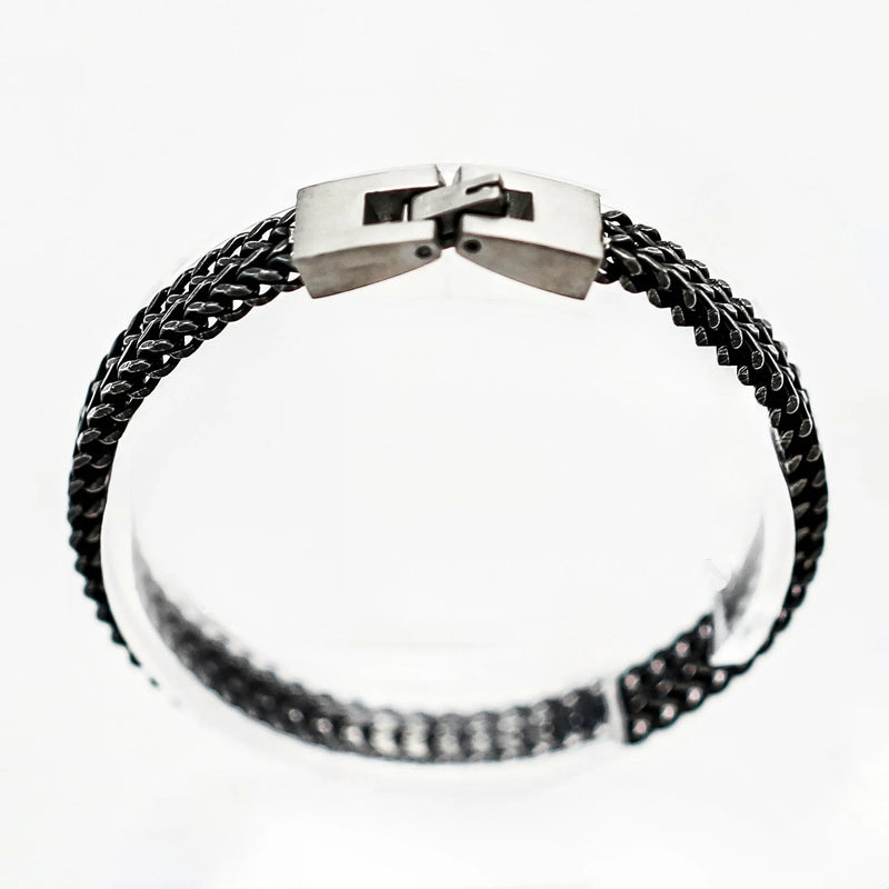 Black braided metal bracelet with a silver clasp.