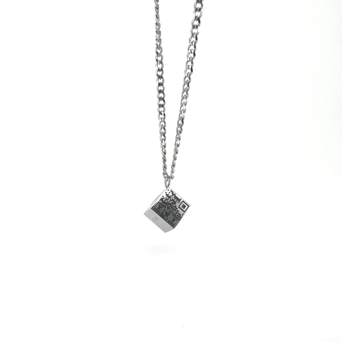 Silver necklace with a cube-shaped pendant featuring a QR code design.