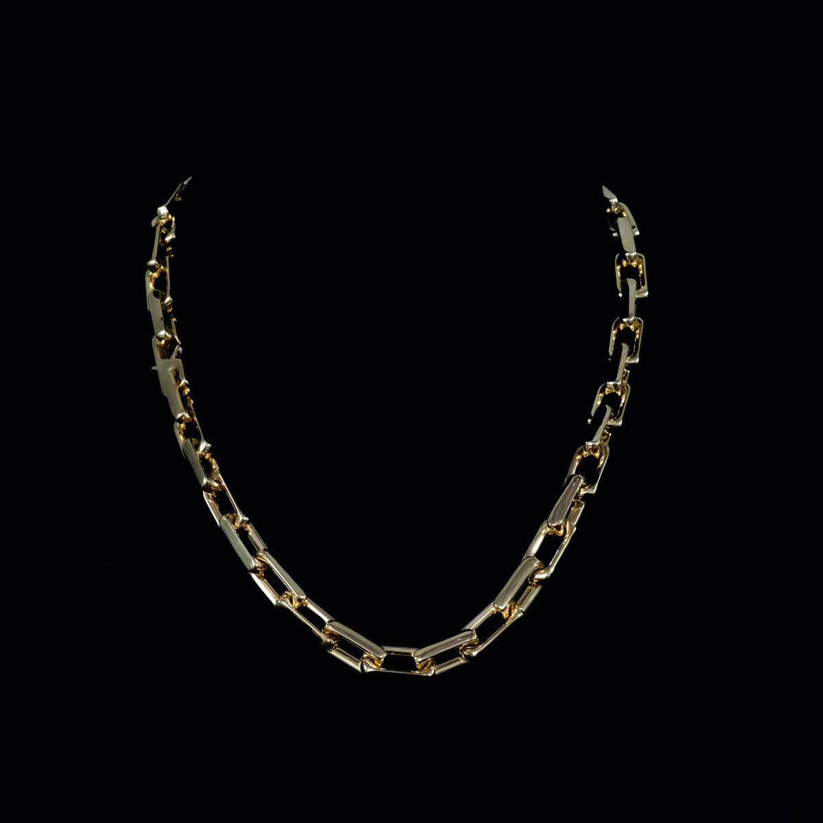 Gold-toned chain necklace with rectangular links.