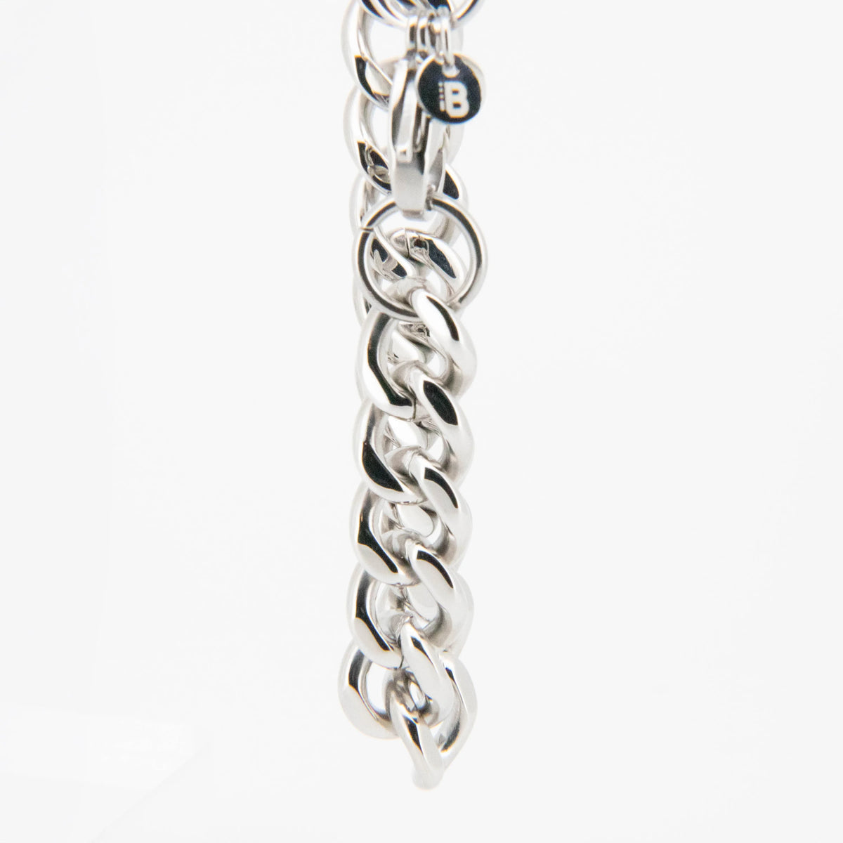 Silver chain bracelet with interlocking links.