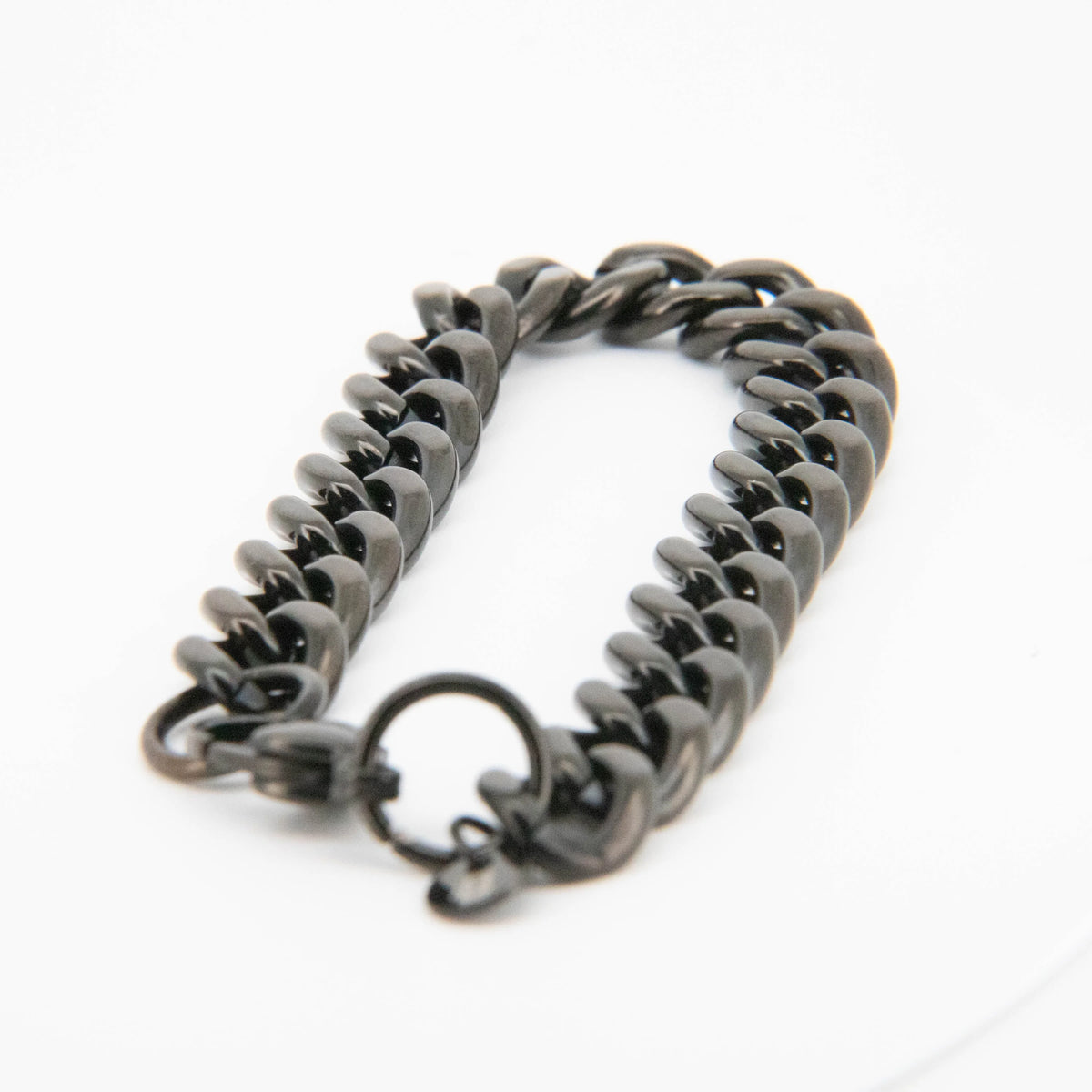 Gunmetal gray chain bracelet with curved links.