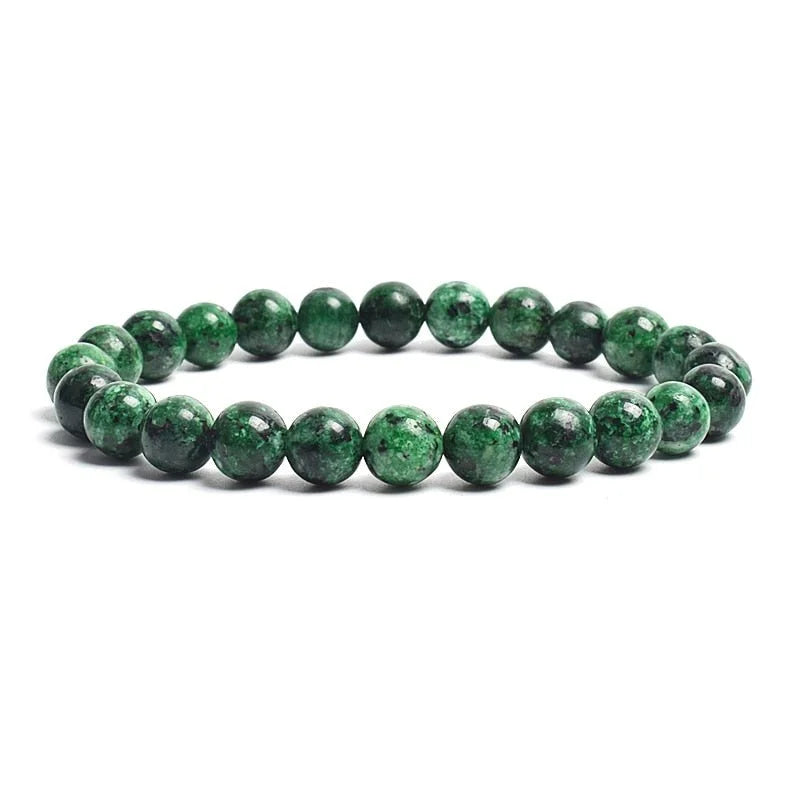 Green gemstone bead bracelet with spherical stones.