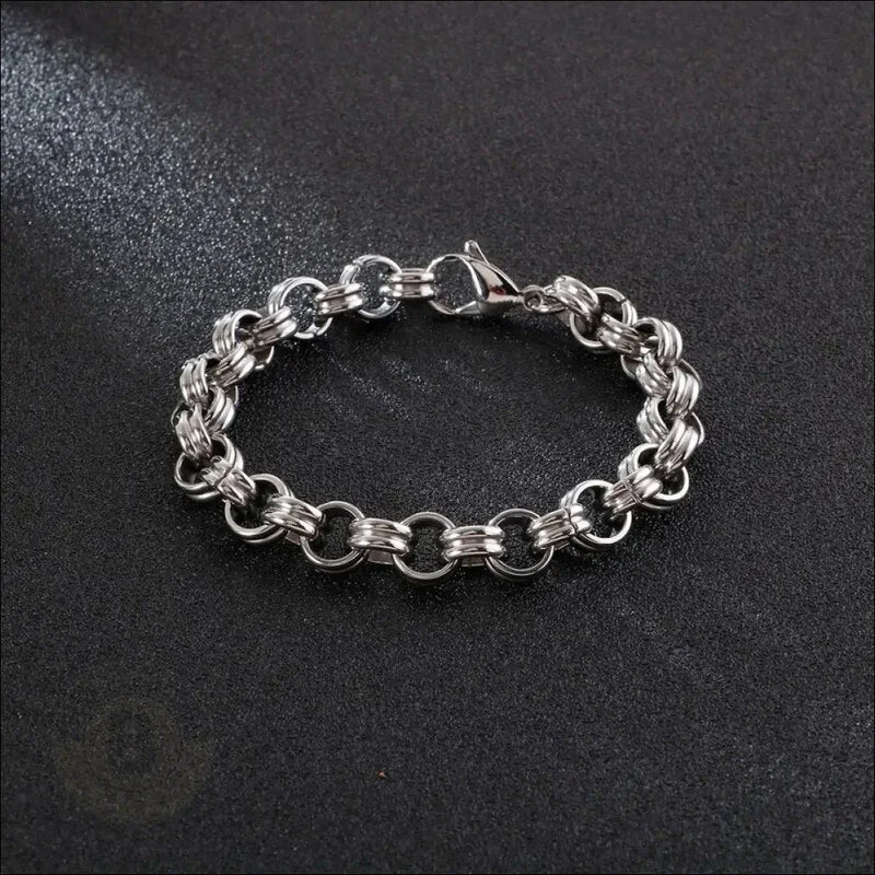 Silver chain-link bracelet with interlocking circular links.