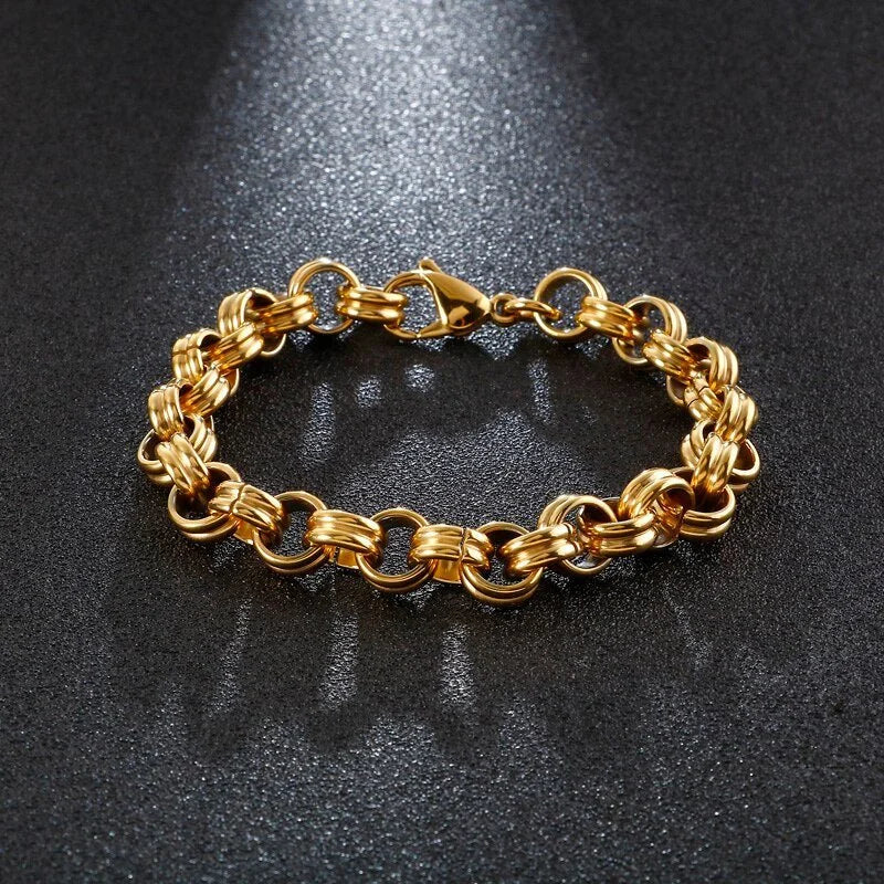 Gold chain bracelet with interlocking circular links.