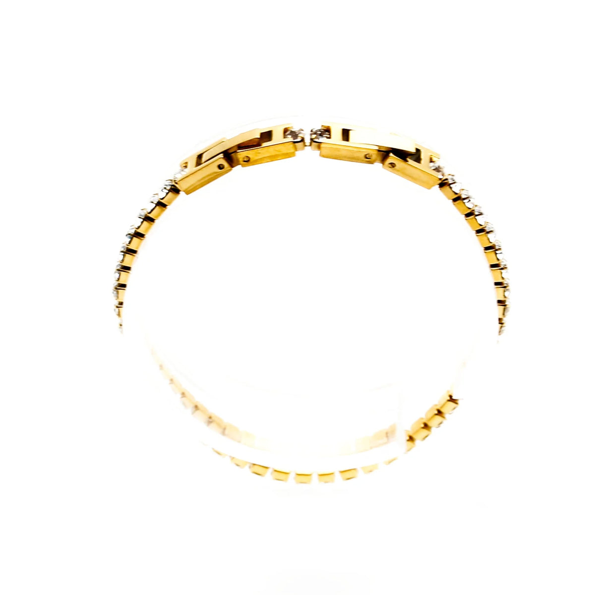 Gold bracelet with alternating gold links and small white gemstones.