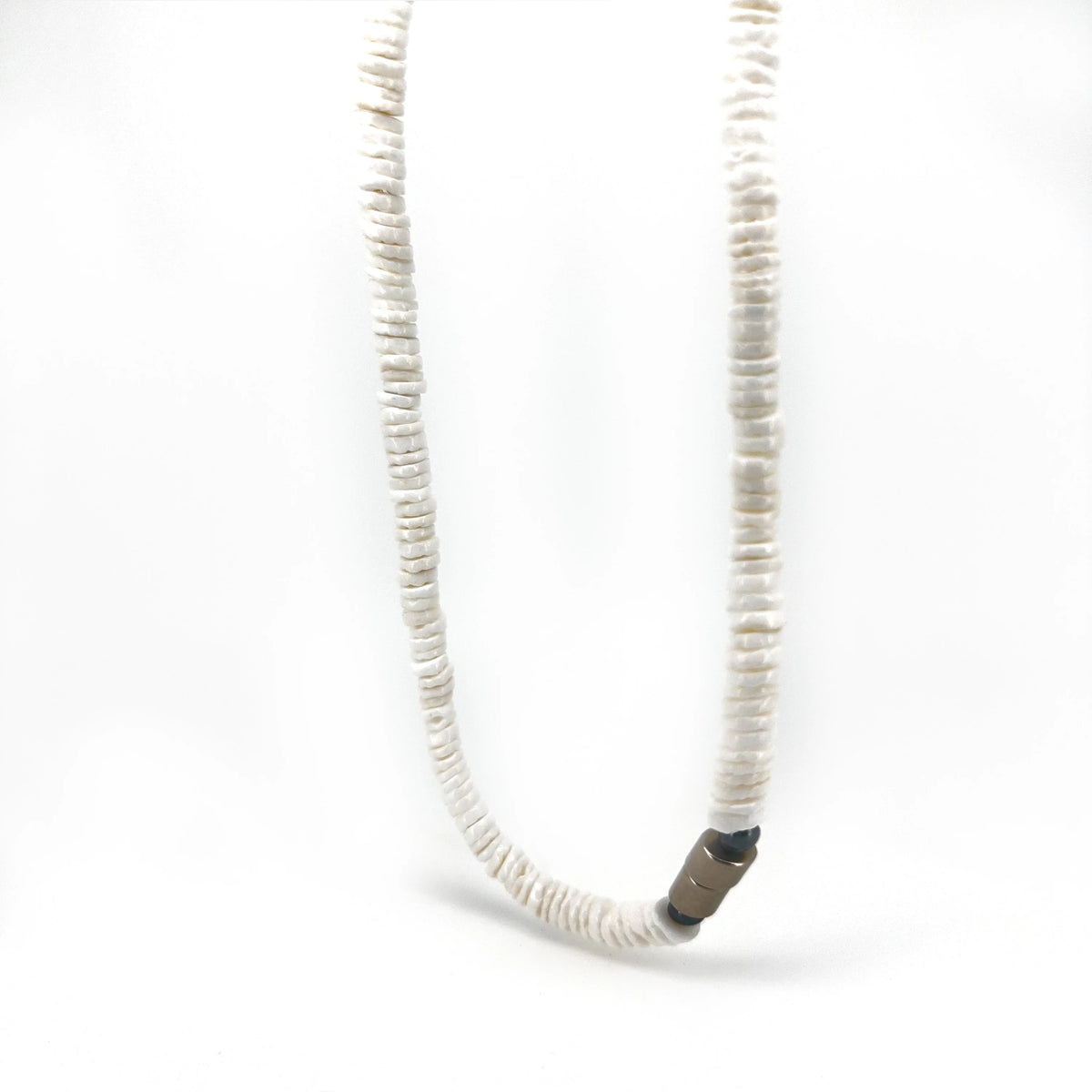 White shell or bead necklace with a dark metal clasp.