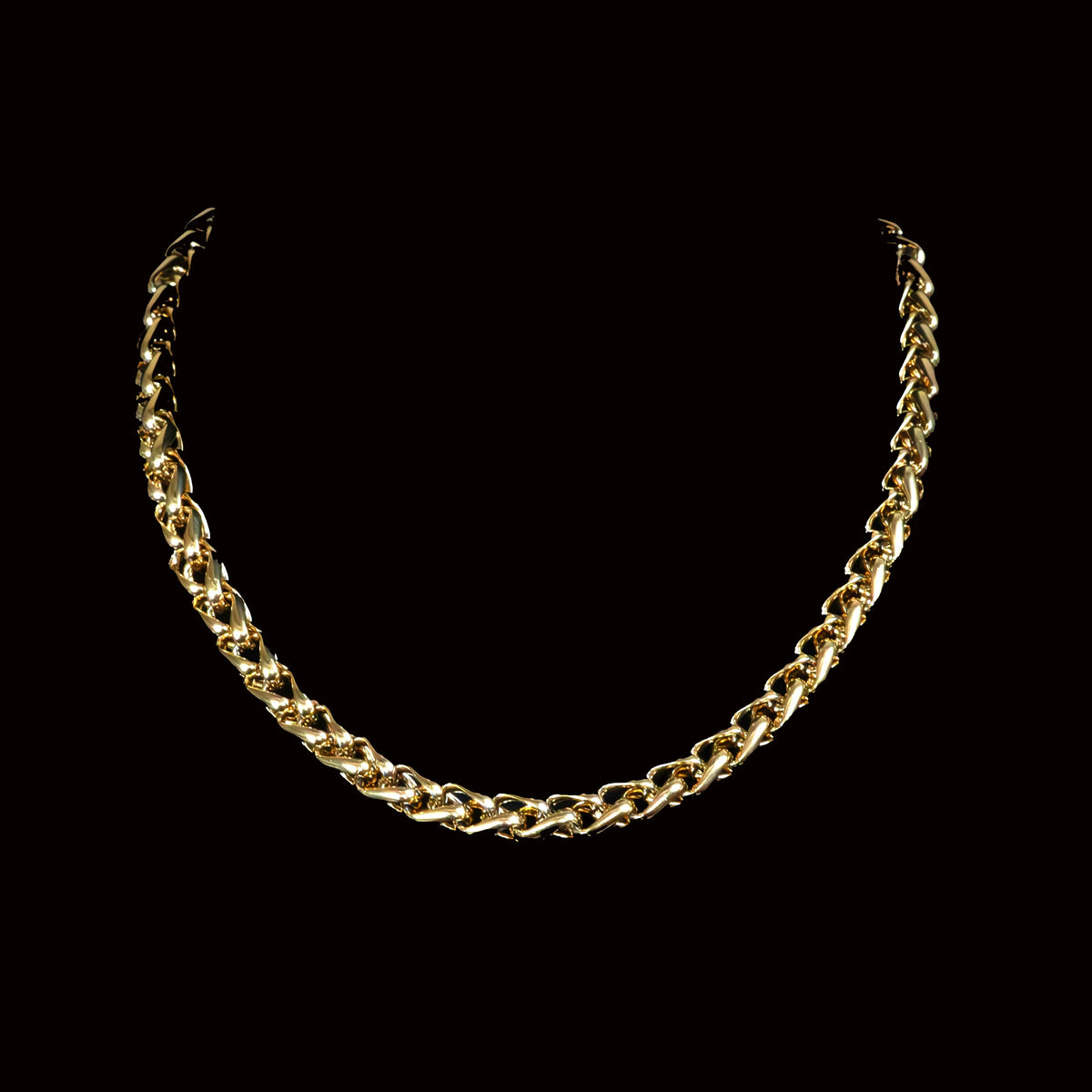 Gold chain necklace with interlocking links.