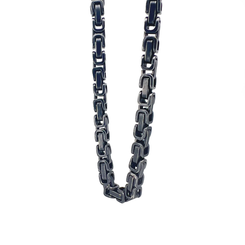 Silver chain necklace with interlocking rectangular links.