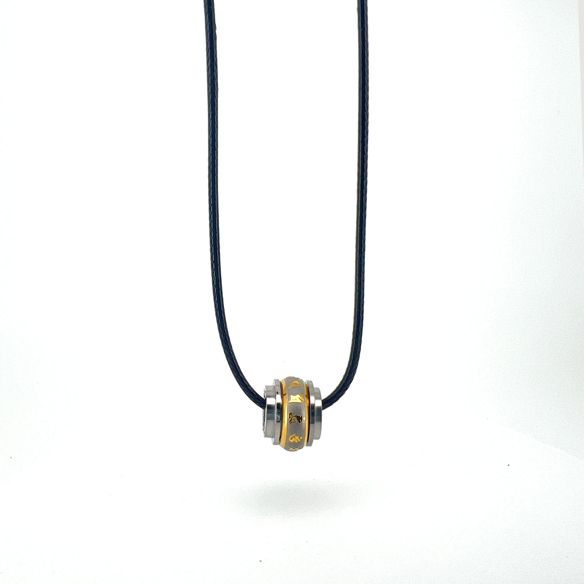 Pendant necklace with a metallic bead featuring gold and silver tones.