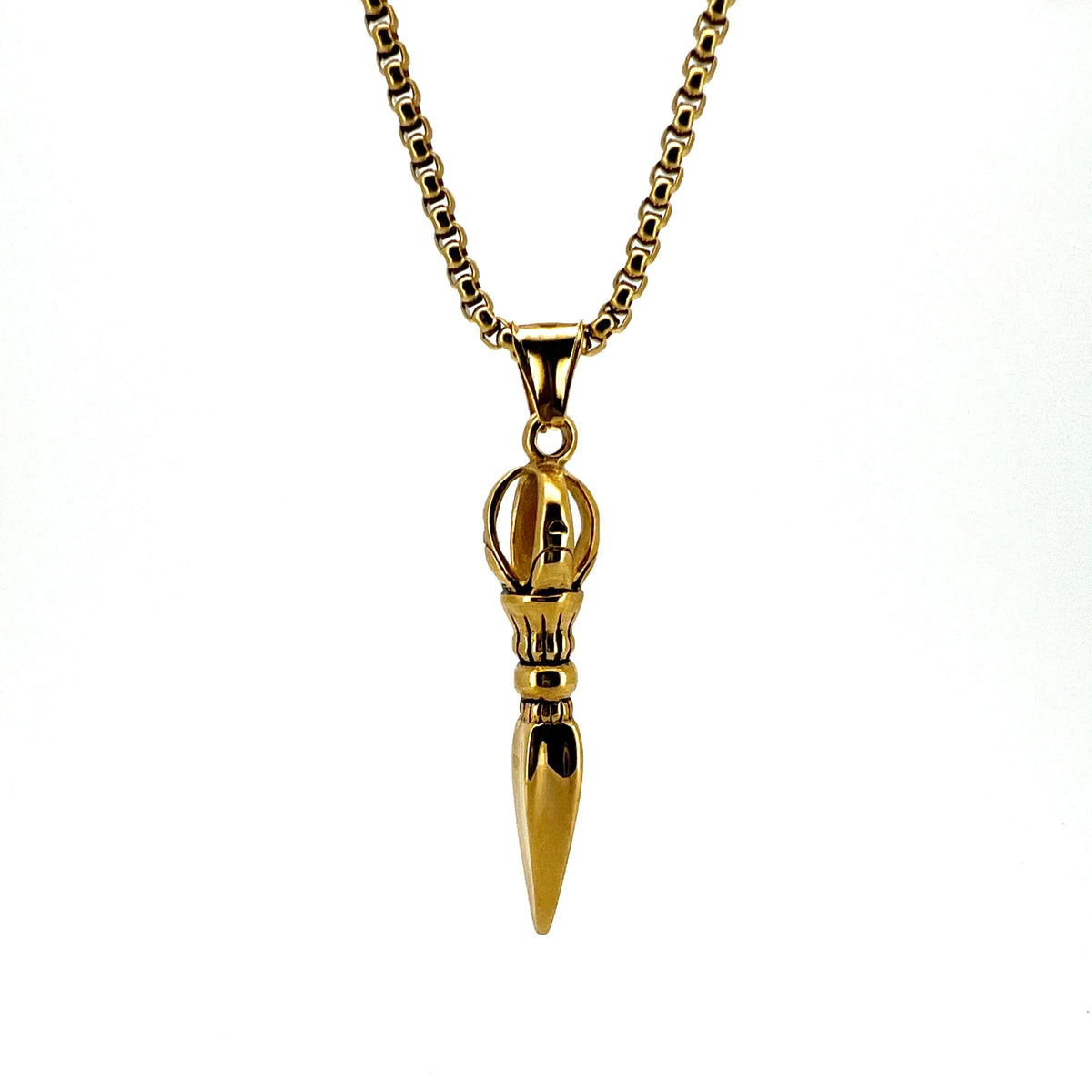 Gold pendant necklace featuring a stylized bullet or missile-shaped charm.