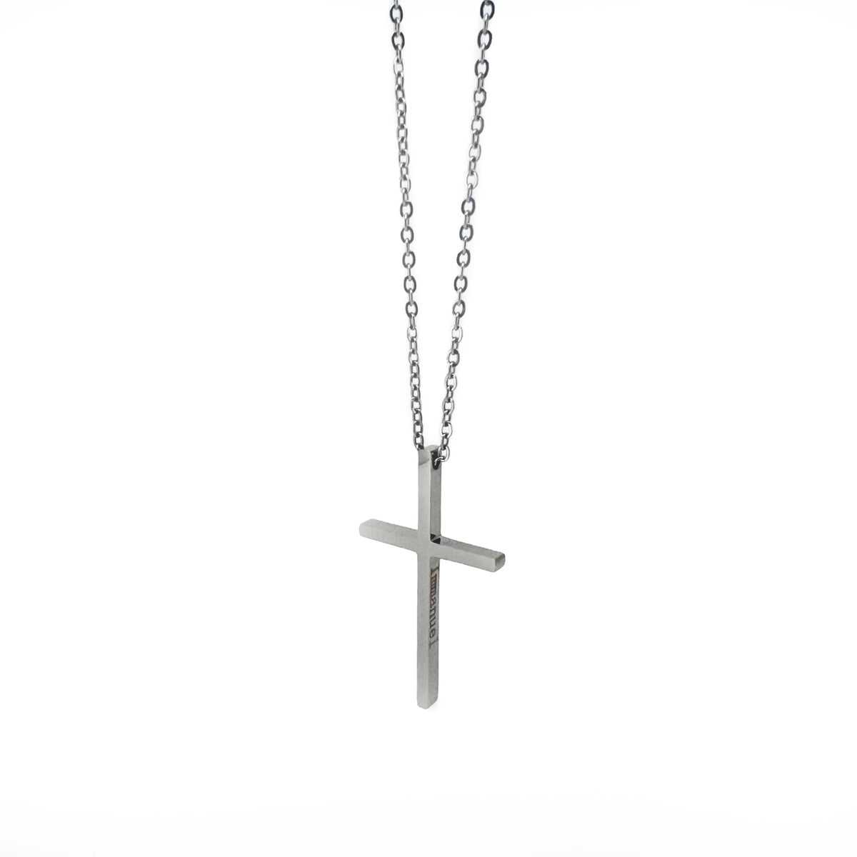 Silver cross pendant necklace with a thin chain.