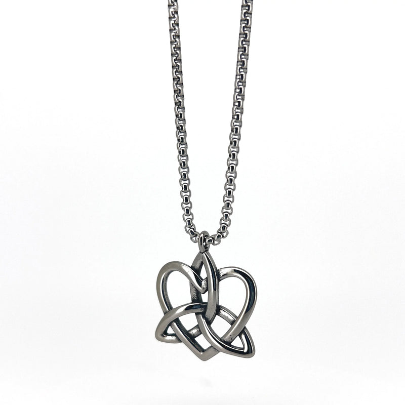 Silver pendant necklace featuring an interlocking heart and trinity knot design.