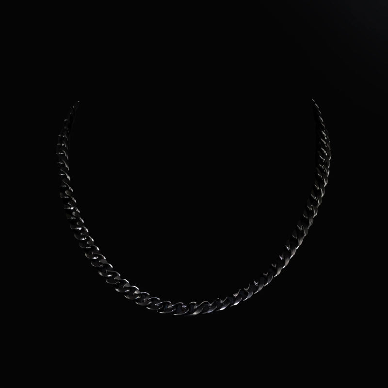 Silver chain necklace with interlocking links.