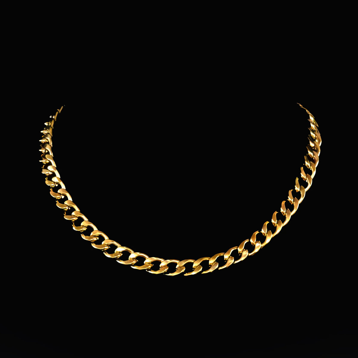 Gold chain necklace with interlocking links.