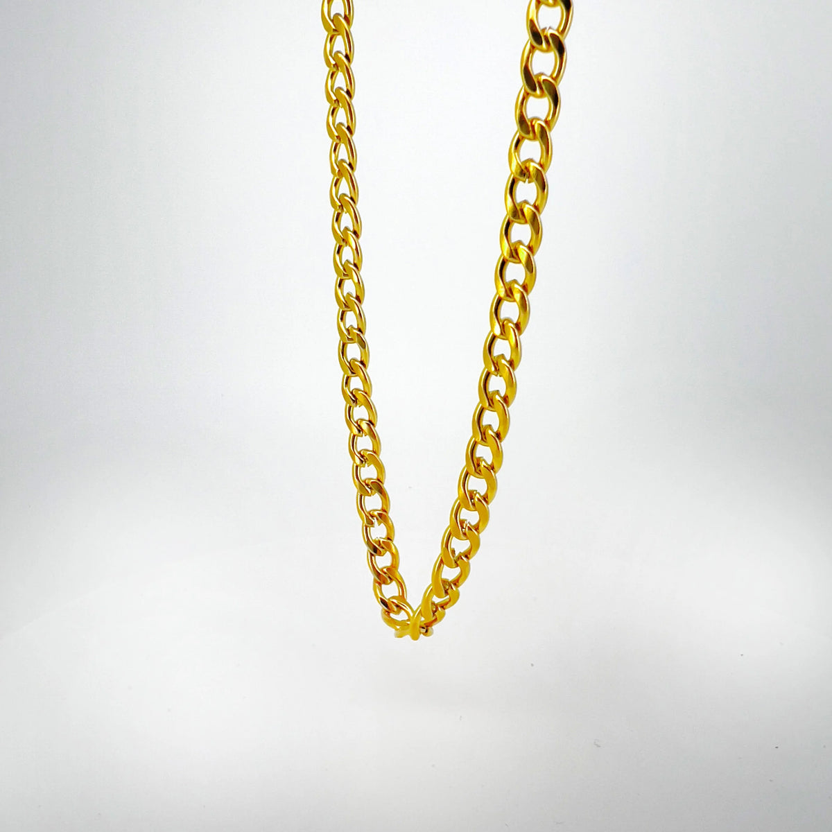 Gold chain necklace with interlocking links.