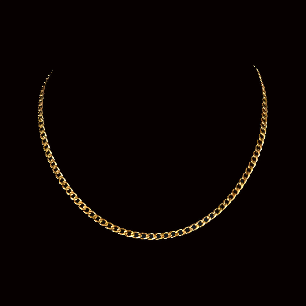 Gold chain necklace with interlocking links.