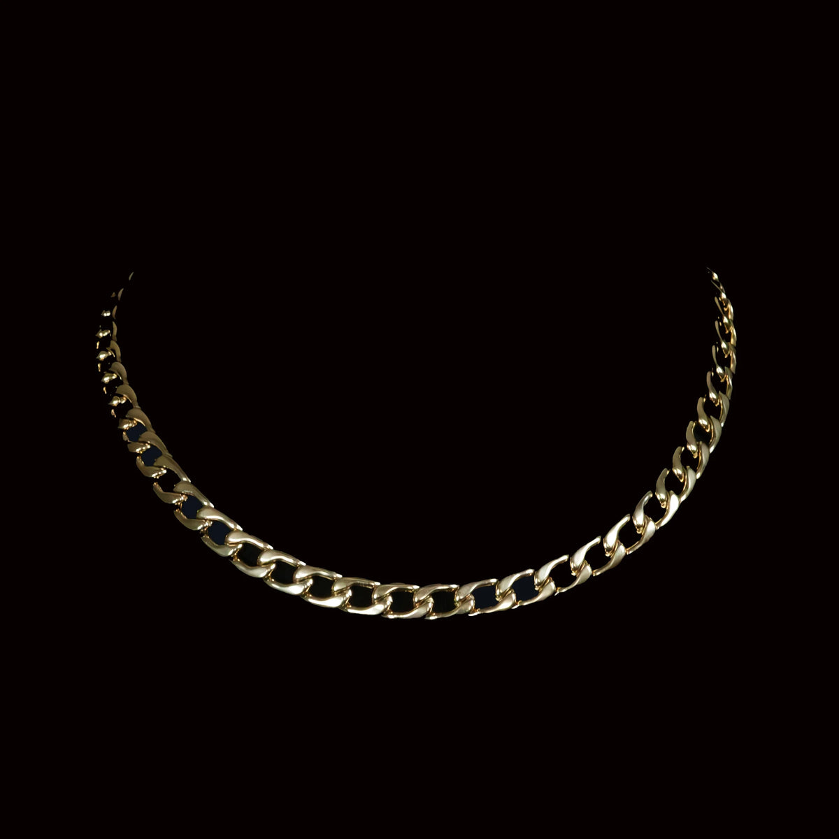 Gold chain necklace with interlocking links.