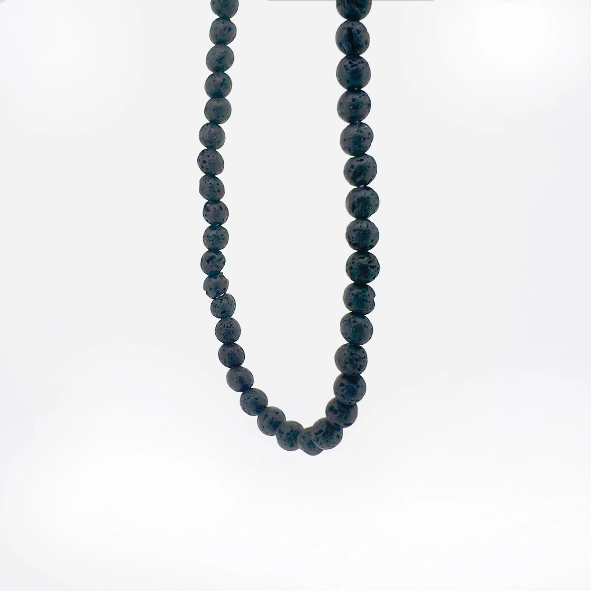 Dark beaded necklace with round stones.