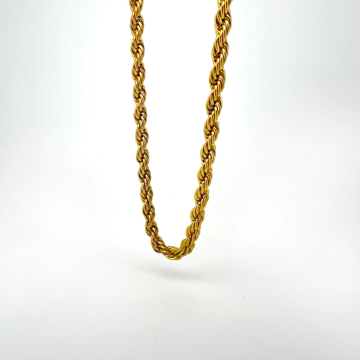 Gold rope chain necklace with twisted links.