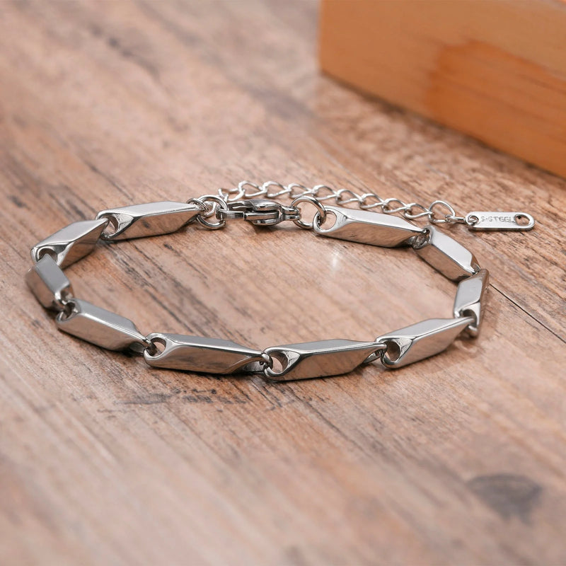 Silver chain bracelet with elongated geometric links.