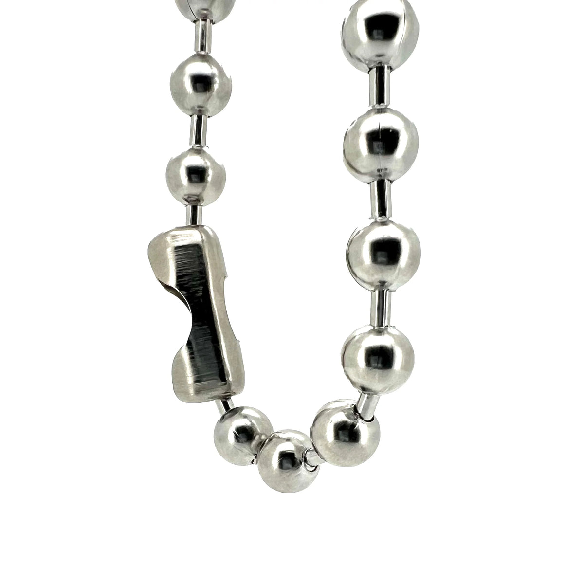 Metal ball chain necklace with a uniquely shaped connector piece.