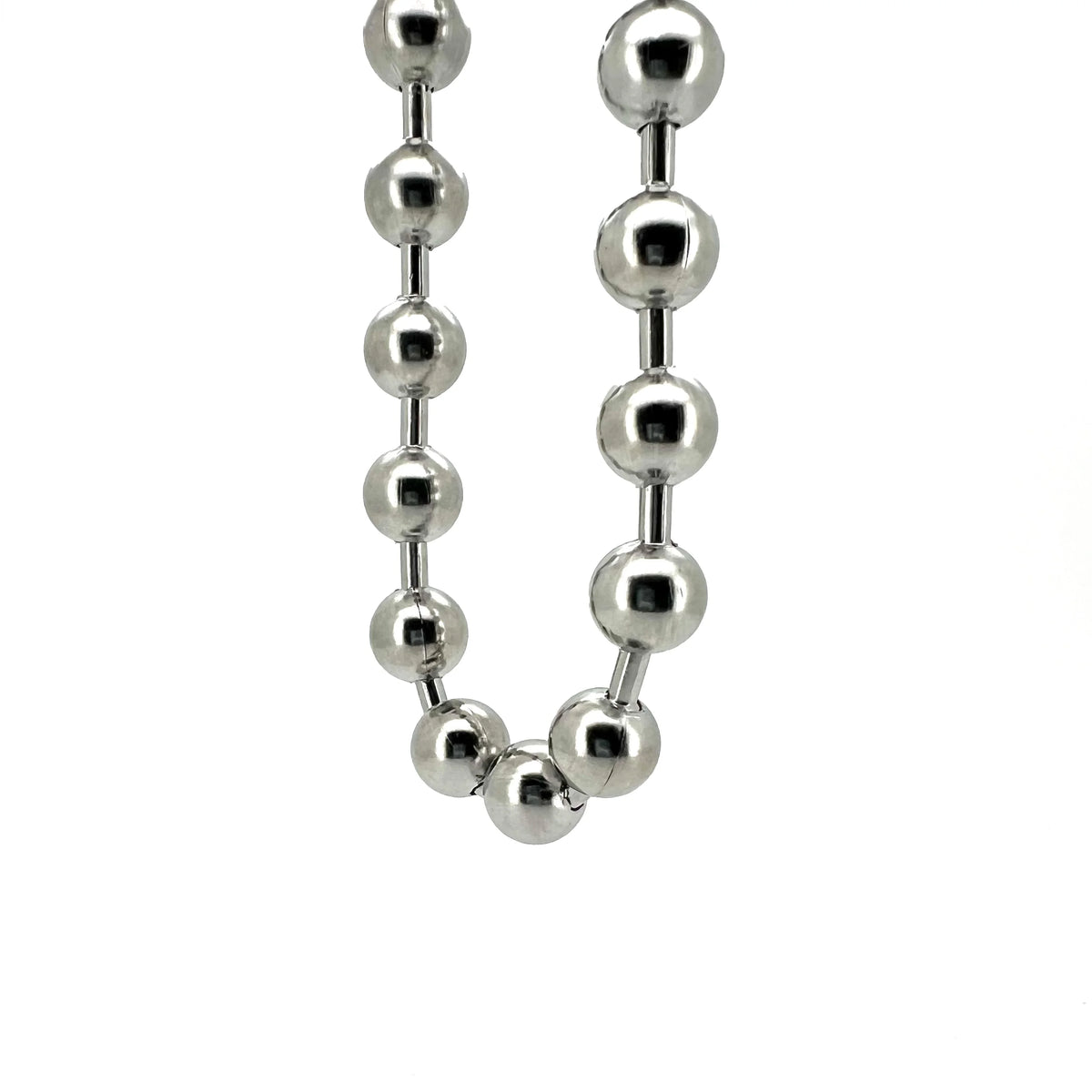 Silver ball chain necklace with evenly spaced spherical beads connected by short cylindrical links.