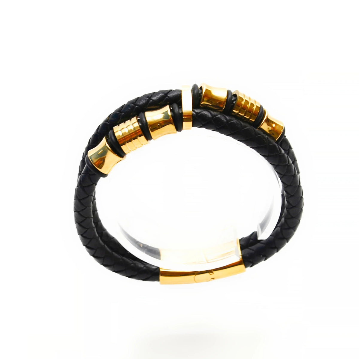 Black leather bracelet with gold-colored metal accents.