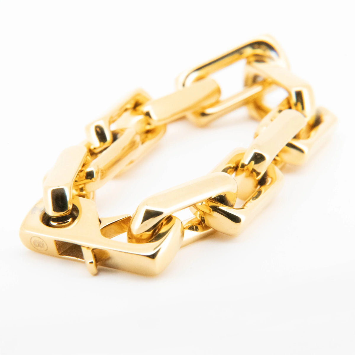 Gold-plated chain link bracelet with rectangular connectors.