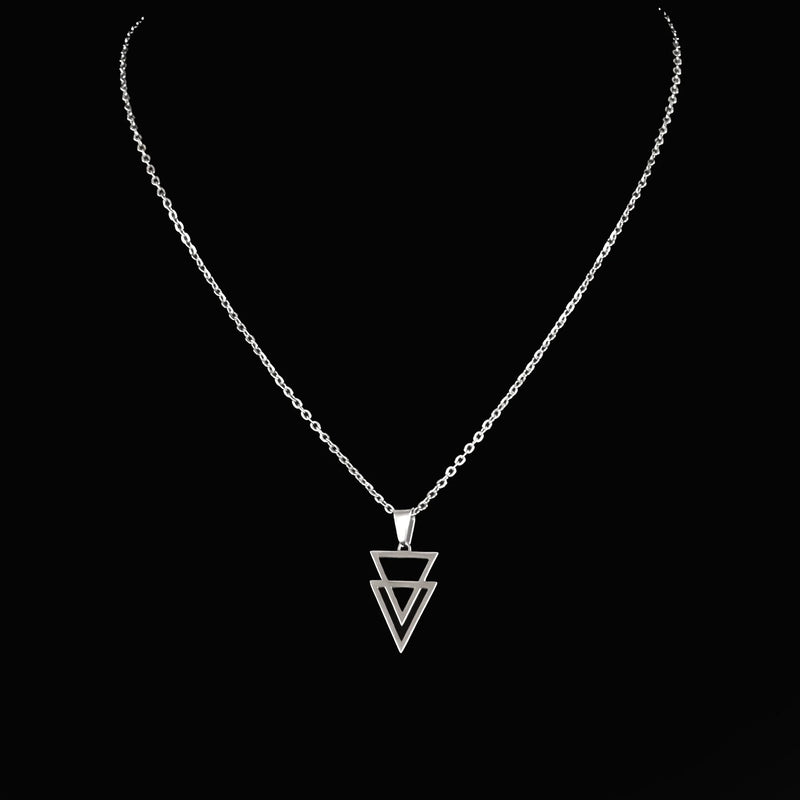 Silver necklace with a geometric triangle pendant.