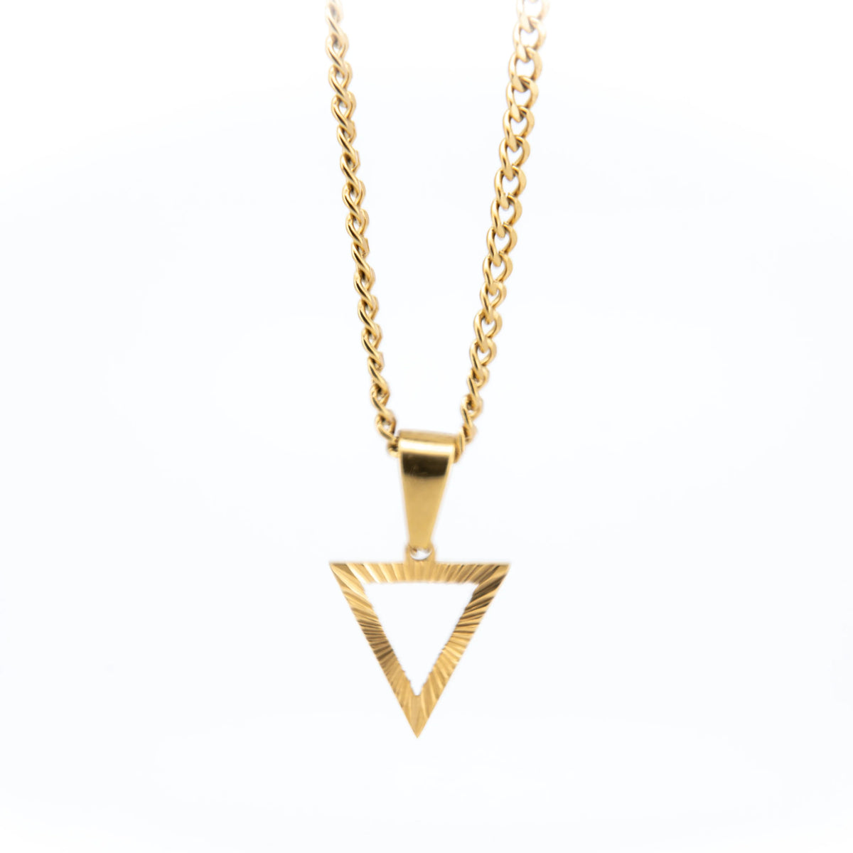 Gold necklace with a triangular pendant.