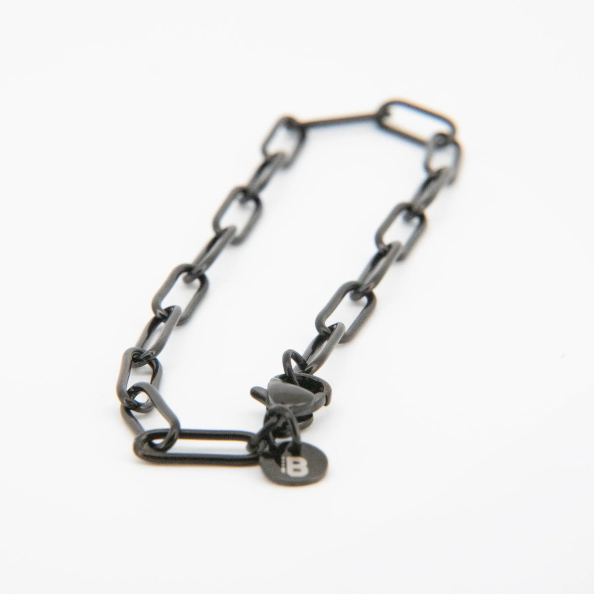 Dark metal chain bracelet with a toggle clasp.