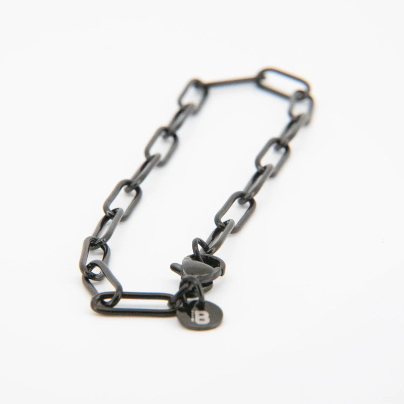 Black chain-link bracelet.