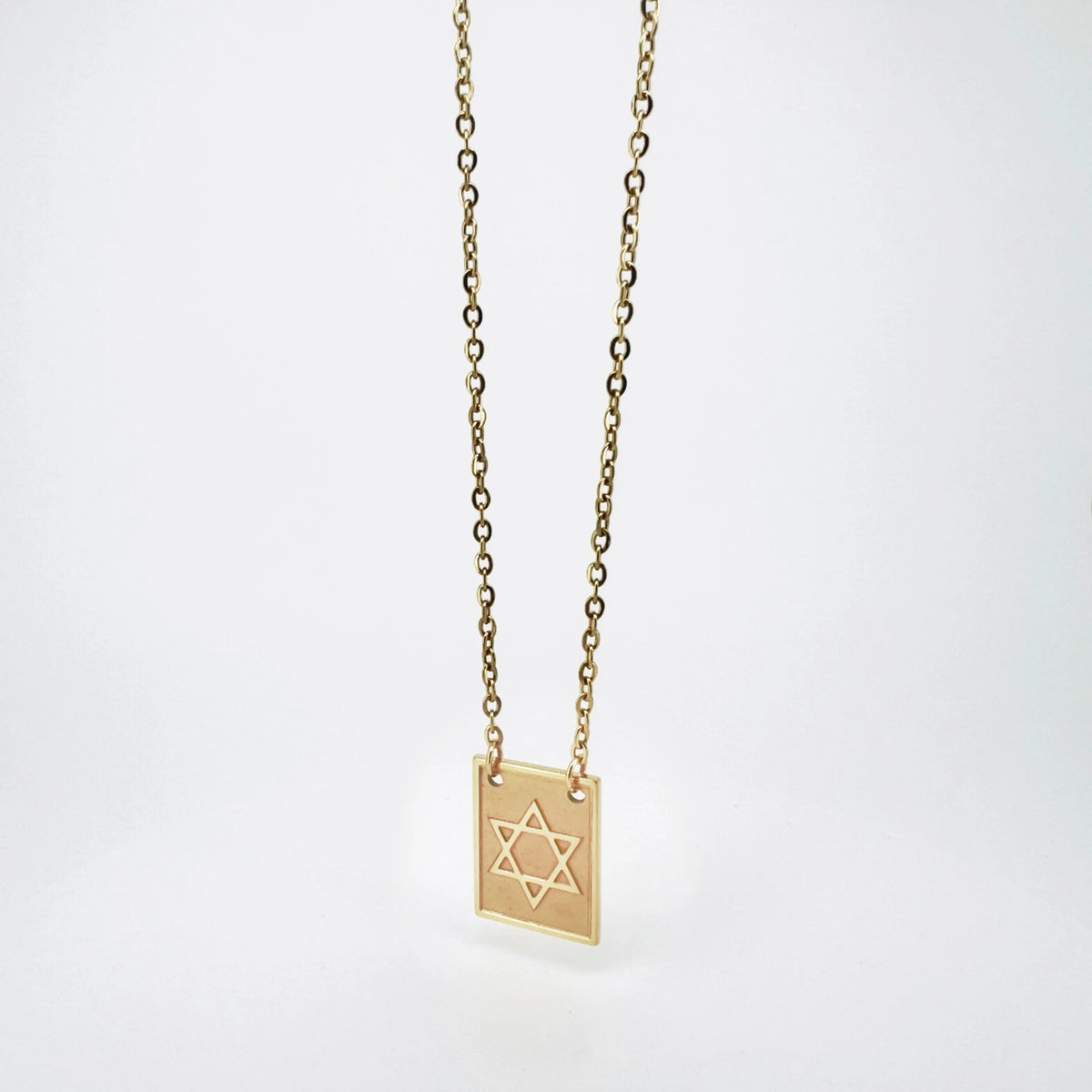 Gold necklace with a Star of David pendant.