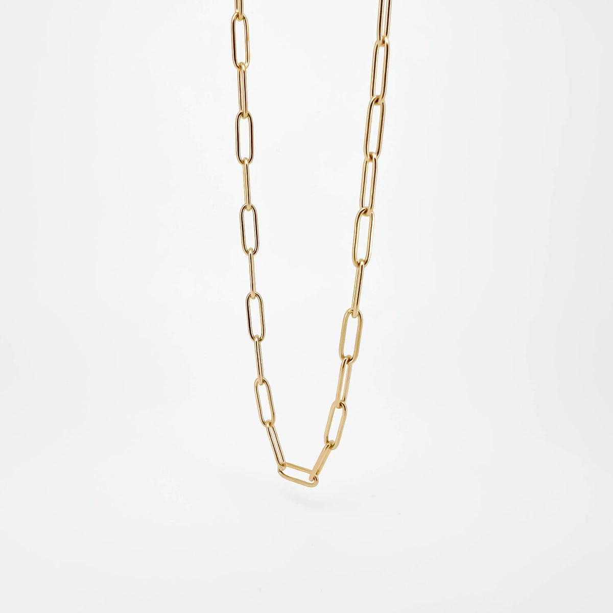 Gold chain necklace with elongated oval links.