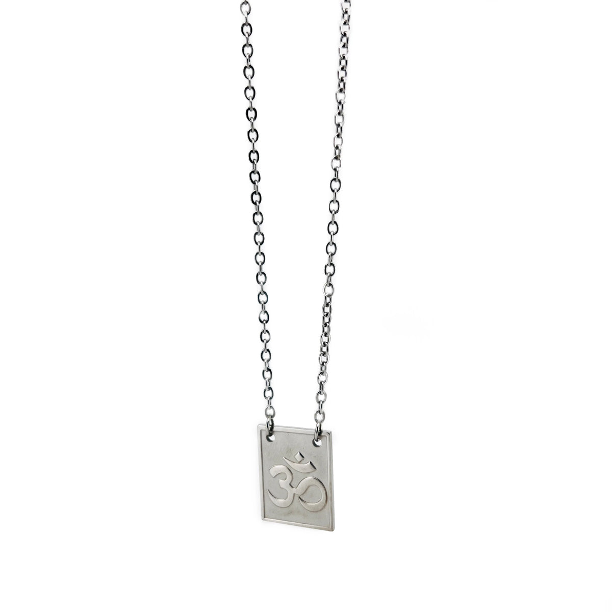 Silver pendant necklace featuring the Om symbol on a rectangular charm.