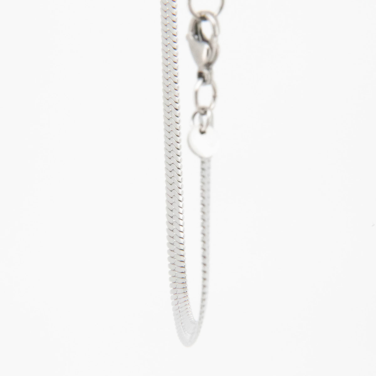 Silver metal zipper with chain pull.