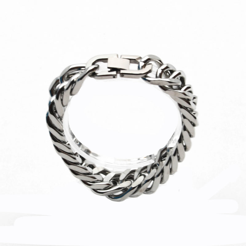 Silver chain-link bracelet with thick, twisted links.