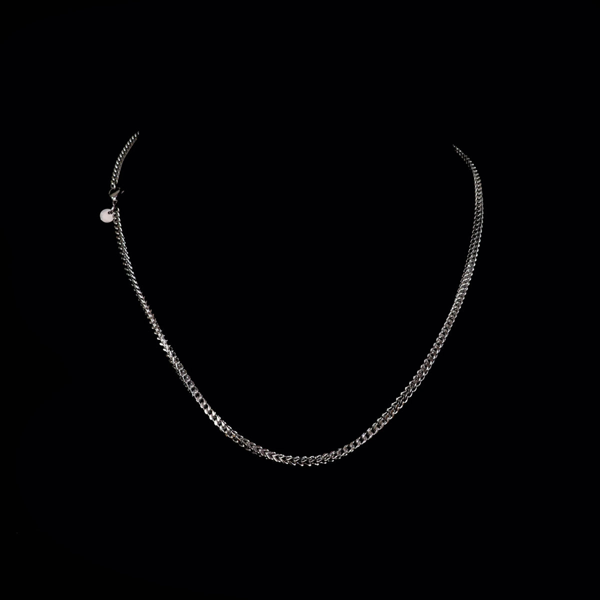 Silver chain necklace with delicate links.