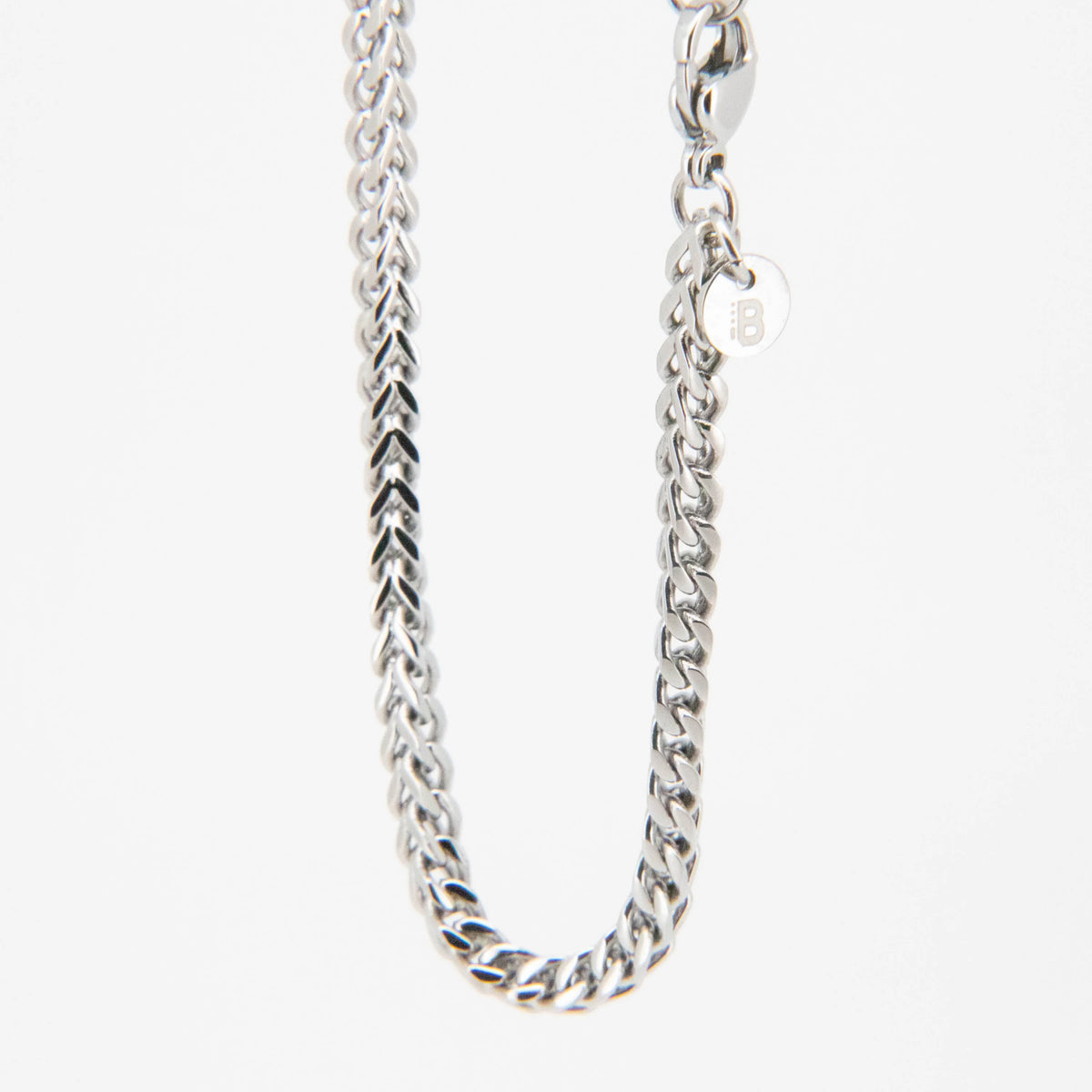 Silver chain necklace with interlocking links.