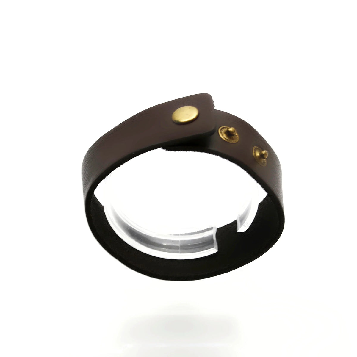 Brown leather bracelet with gold-colored metal studs.