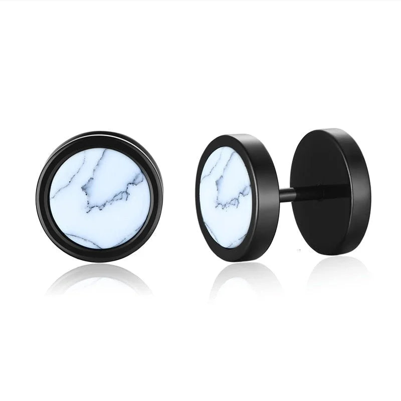 Pair of black stud earrings with white marble-like inlays.