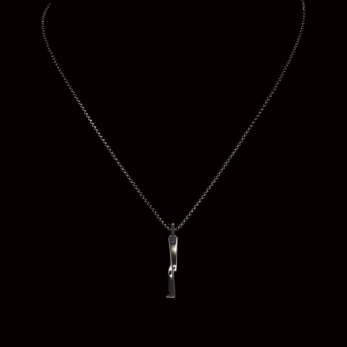 Silver pendant necklace with a twisted bar-shaped charm.