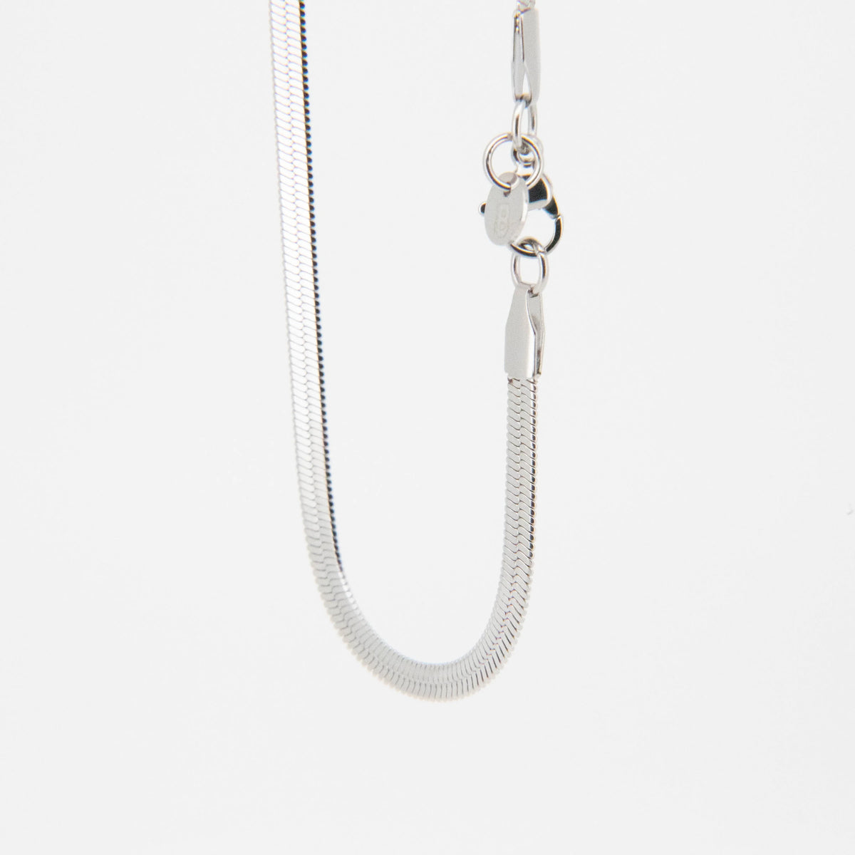 Silver snake chain necklace with a lobster clasp.