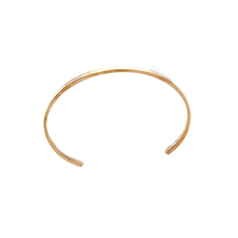 Simple gold-toned open bangle bracelet with a minimalist design.