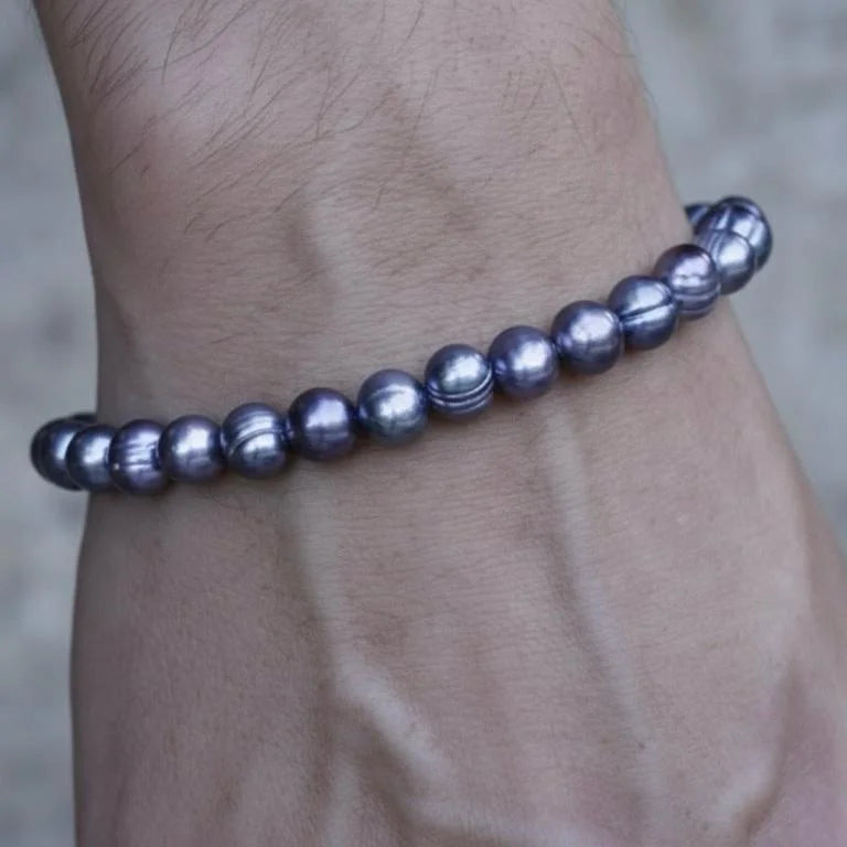 Purple beaded bracelet with metallic finish