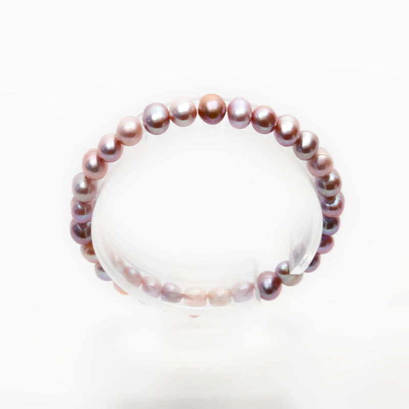 Pearl bracelet with multicolored pearls strung together.